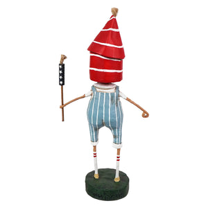 A lori mitchell lilfirecrackers set figural decor with a red white striped rocket head and wooden limbs holding an american flag torch