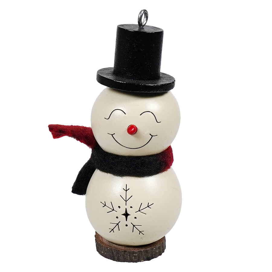 A charming white wooden snowman gourd ornament with black top hat and red scarf perfect for meadowbrooke large snowman decor