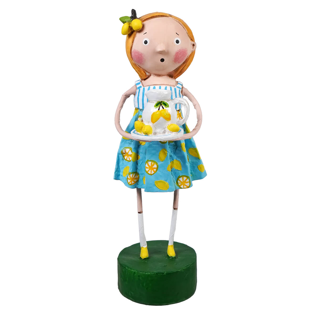 A whimsical lori mitchell figurine of a girl with orange hair in lily anne’s lemons blue dress holding a lemon pitcher