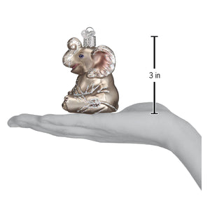 Little elephant ornament is a silver figural decor with glittery pink and white accents and purple eyes for lighted decor