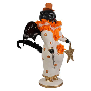 Little fancy pants cat black cat figurine dressed as halloween cats clown in white polka-dot coat with orange hat