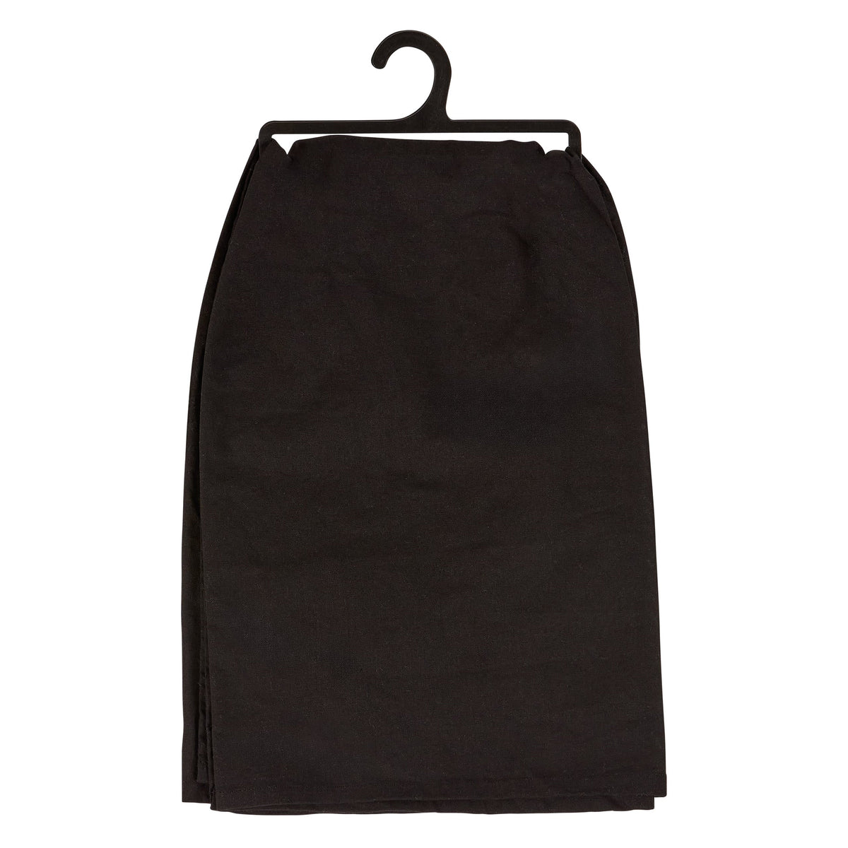Black skirt hanging on a hanger near a dead and breakfast inn kitchen towel for cozy inn kitchen vibes