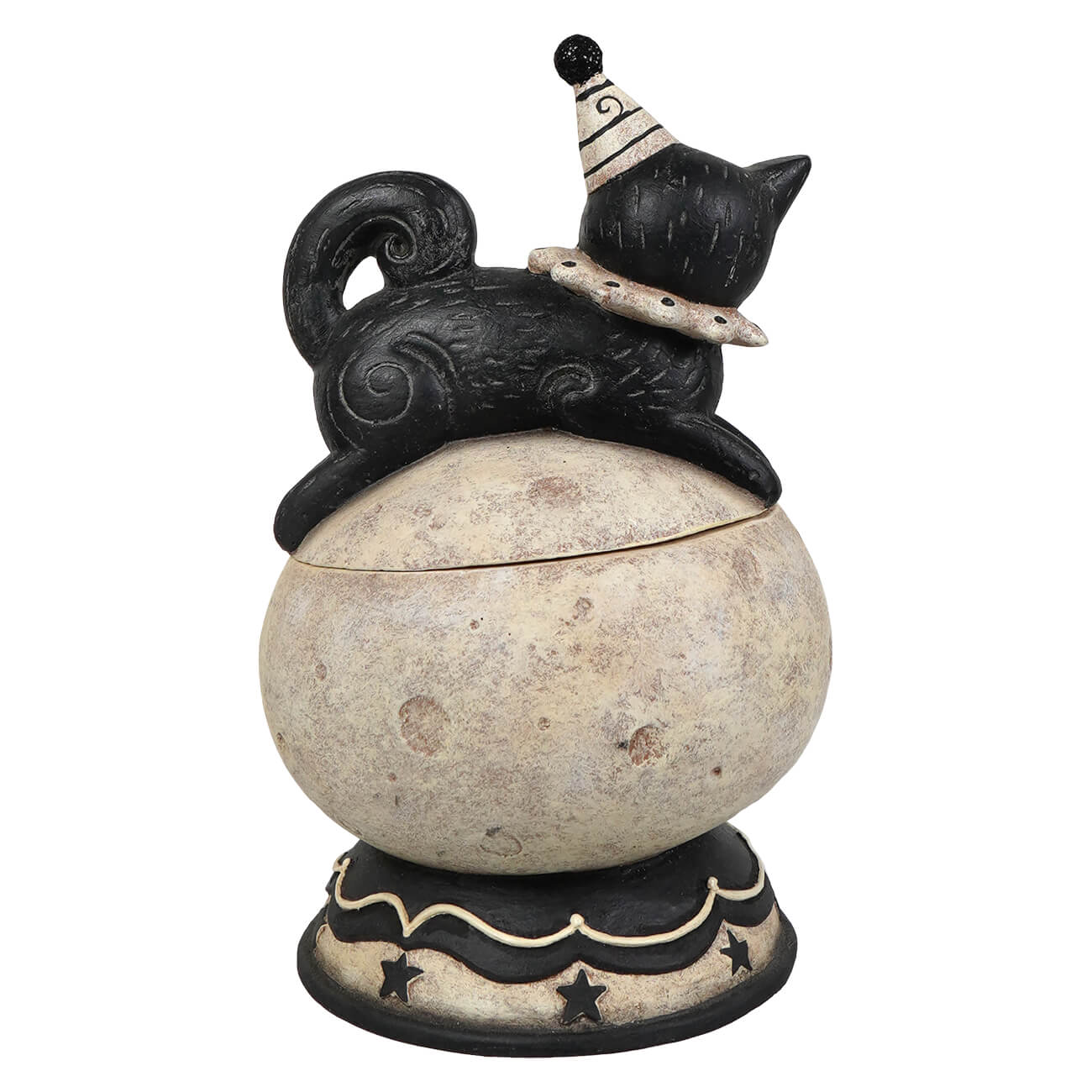 Black ceramic cat figurine wearing striped party hat sitting on textured off white jack o lantern base with stars feet
