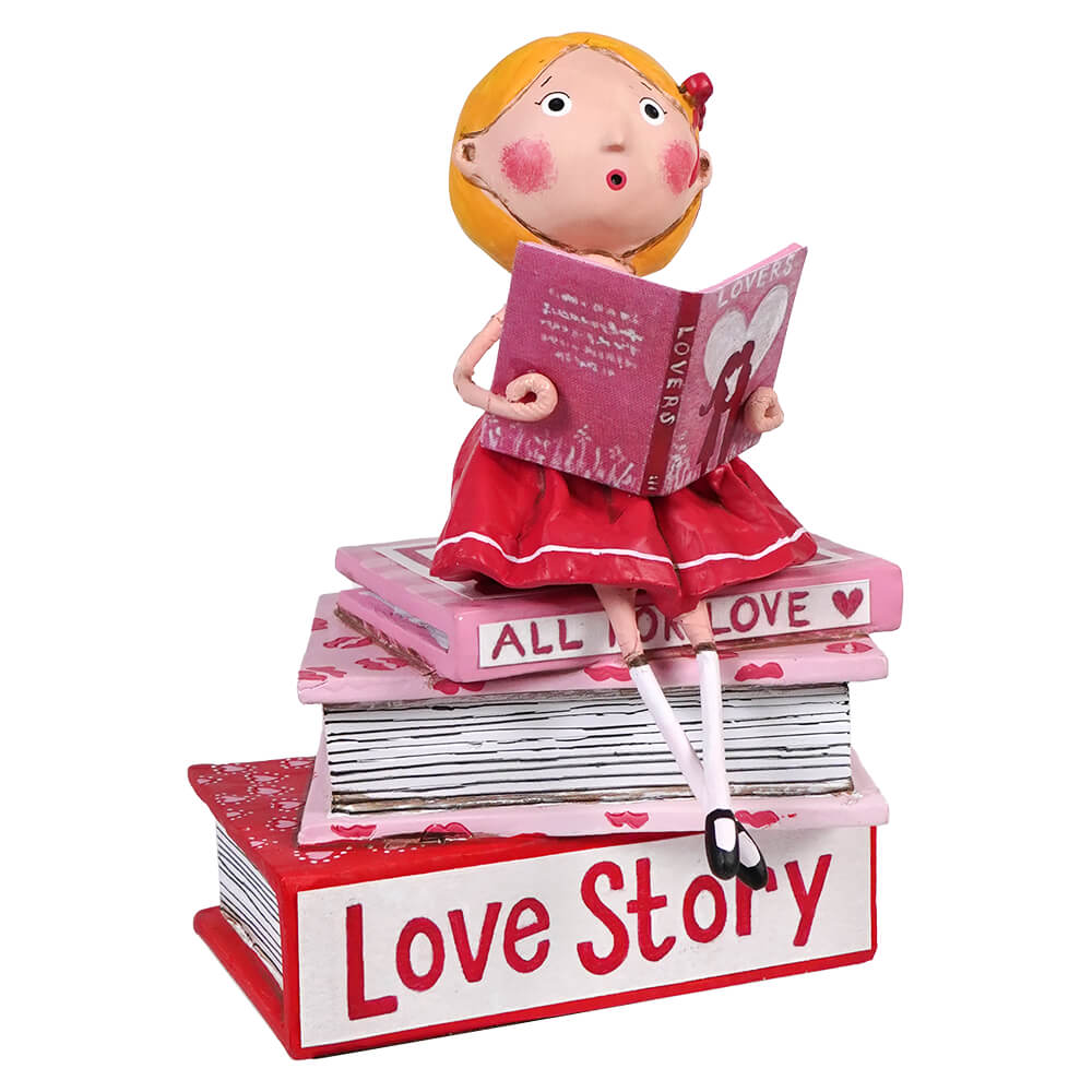 A cartoon figurine reading a book while sitting atop a stack of pink and red love-themed books.