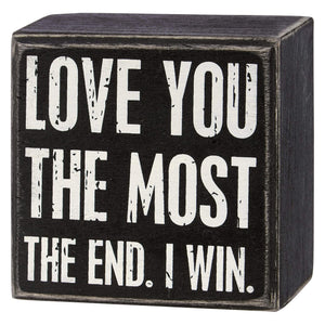 Black wooden win box sign with distressed white lettering love you the most the end perfect valentine’s day tabletop decor