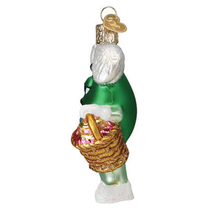 Green easter ornament featuring a green glass santa claus holding a colorful woven basket from m&m’s food & drink ornaments