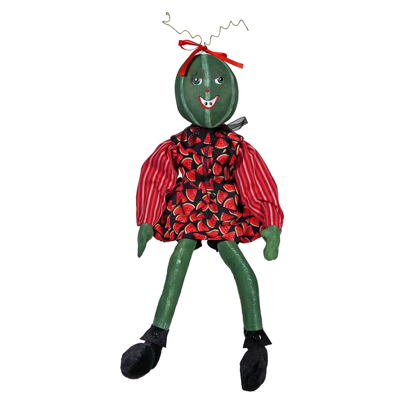 Whimsical watermelon doll wearing a red patterned dress and black shoes.