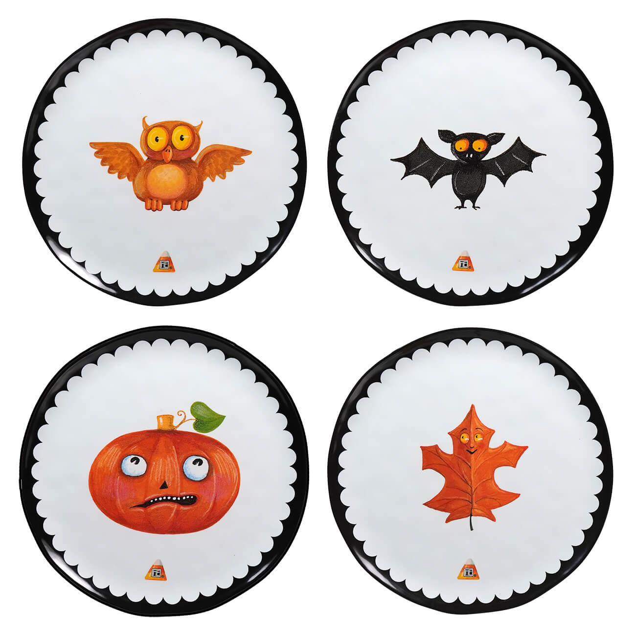 Four circular plates with Halloween-themed designs featuring an owl, bat, pumpkin, and autumn leaf.