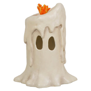 Off-white candle luminary shaped like a ghost with an orange flame detail on top for spooky decor