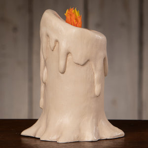Cream-colored ceramic candle luminary with stylized orange and yellow flame for medium flam’in candle luminary