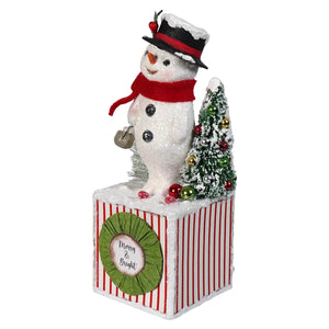 White glittery bright snowman figurine by bethany lowe designs holding bell beside mini christmas snowman figures decor