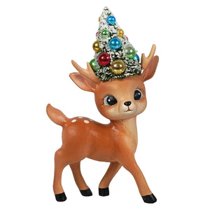 A charming brown bethany lowe design merry and bright standing reindeer with white spots and a festive tree on its head