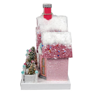 Merry holiday house glittery pink christmas house ornament with snow roof red chimney and festive tree by cody foster
