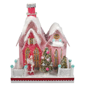 Pink merry holiday house christmas village figurine by cody foster with snow-dusted roofs and glittery red chimney