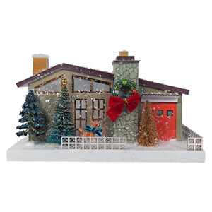 A merry midcentury modern festive miniature house by cody foster with gray stone facade red door and light cord features