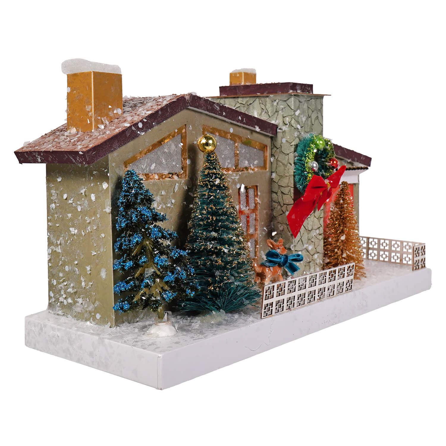 A merry midcentury modern festive miniature house by cody foster with beige stone facade orange chimneys and light cord