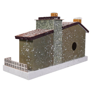 Merry midcentury modern olive-green birdhouse with cracked stone walls white snowflake speckles and dark brown roof by cody foster