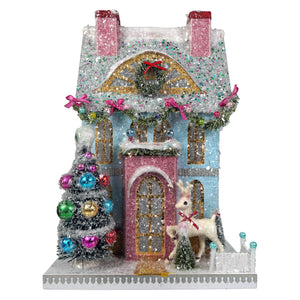 A glittery blue cody foster merry reindeer chateau ornament with pink accents tree reindeer and light cord