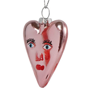 Pink glossy glass heart ornament with painted face blue eyes red lips cody foster heart ornament