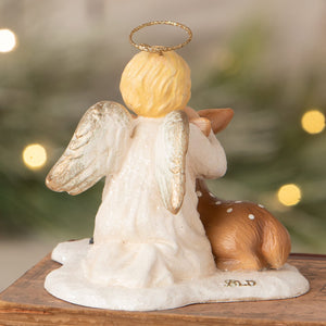 Michael angel with deer bethany lowe angel figure with golden halo and silver wings hugging a brown spotted deer