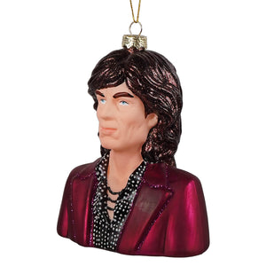 A glossy glittery mick jagger glass ornament featuring a bust with dark hair and maroon jacket on a glass ornament