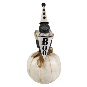Midnight messenger crow figurine wearing a white and black polka-dotted jester hat holding a boo banner bethany lowe halloween