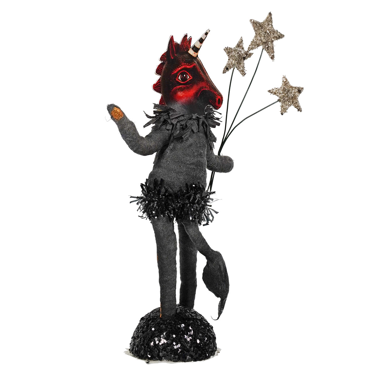 A whimsical midnight unicorn figure by johanna parker with a red spun cotton horn and glittery star accents on a sequined base