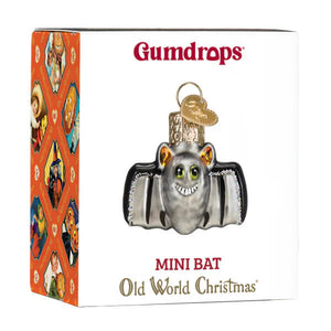 Silver glass mini bat ornament with green eyes and smiling face by gumdrops for old world christmas holiday decor