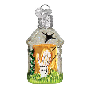 Silver glass mini tombstone ornament with glitter texture, black bat, and orange glowing hand in green grass design