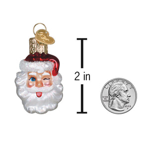 Mini winking santa ornament is a charming red and white christmas glass ornament with blue eyes and a playful wink