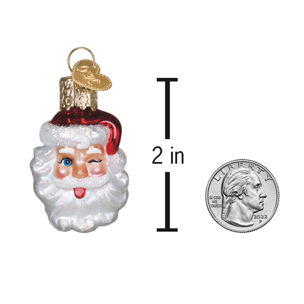 Mini winking santa ornament is a charming red and white christmas glass ornament with blue eyes and a playful wink