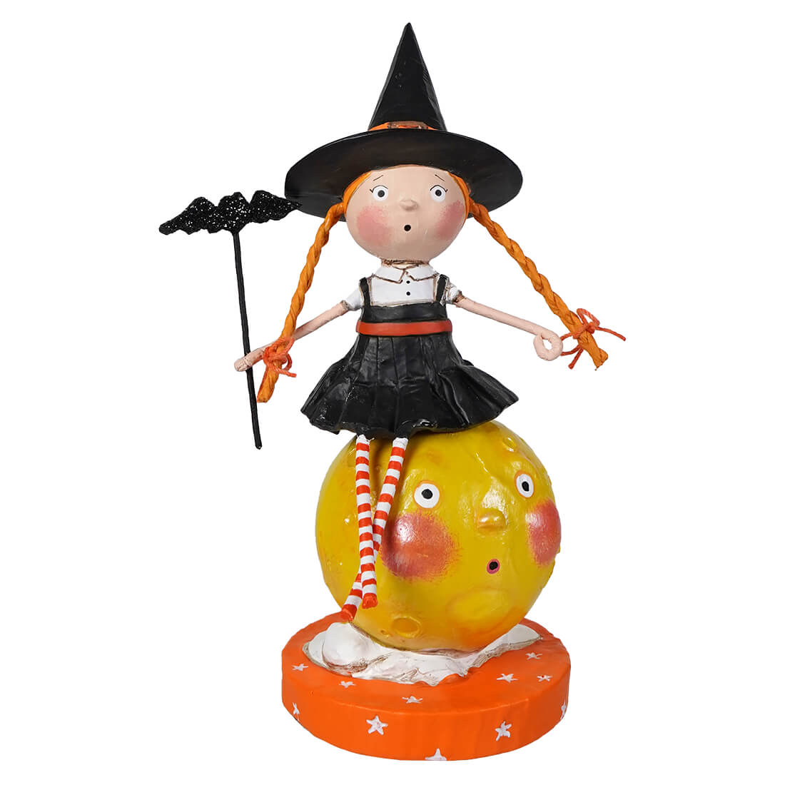 A lori mitchell halloween witch figurine with orange hair on a yellow moon base perfect for mischief on the moon decor