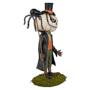 A halloween figural decor featuring mr gourdy with a white pumpkin head, stitched face, and black top hat with spider for halloween pumpkins and gourds