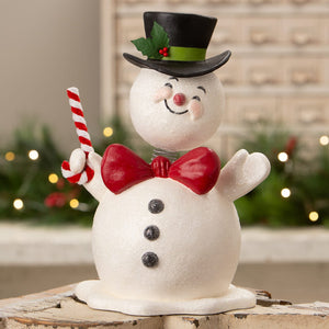 Cheerful white snowman figurine with glittery finish wearing black top hat and red bow tie holding candy cane mr jolly bobble head bethany lowe design christmas snowman figures & decor