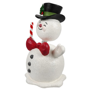A festive white glittery christmas snowman figure with black top hat green holly red berries and candy cane by bethany lowe design jolly bobble head