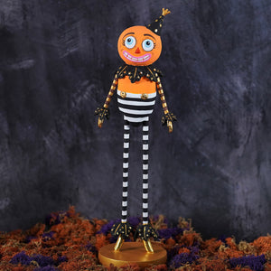 Orange kook pumpkin man figurine with black and white striped body gold accents and party hat for halloween pumpkins gourds display