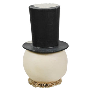 Cream-colored jolly bobble snowman candle with black top hat and beige ruffled trim in a festive snowman container