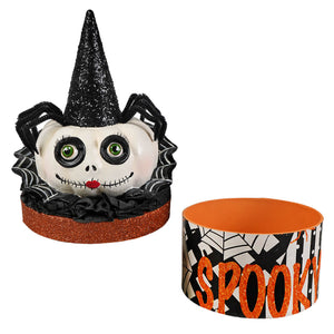 Black glitter witch hat with spider and skull design on white pumpkin base in mrs casperita halloween pumpkins and gourds box
