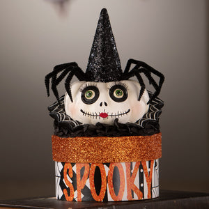 Mrs casperita halloween decorative box with a white skull, green eyes, red lips, witch hat, and black spider accents