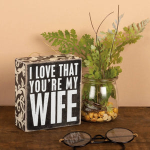 Black and white distressed wooden wife box sign with ornate sides and bold i love that youre my wife text