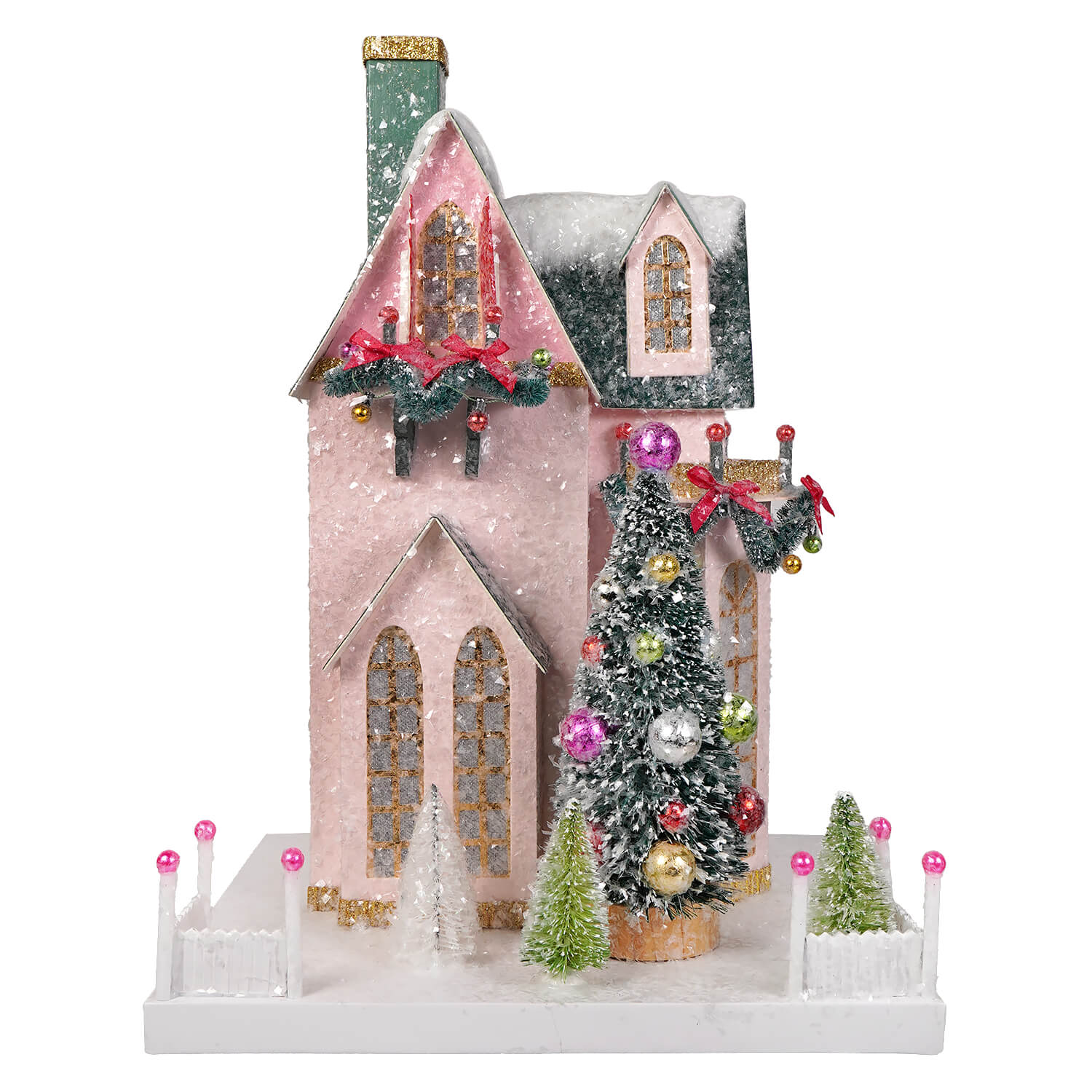 Pink glittery christmas house with green chimney and red bows from cody foster christmas village with light cord