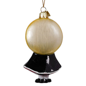 A translucent gold glass vampire ornament in a black dress with white trim, perfect halloween ornaments by noble gems