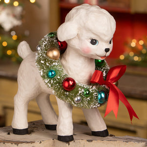 White ceramic noelle lamb figurine by bethany lowe design with festive wreath and colorful ornaments