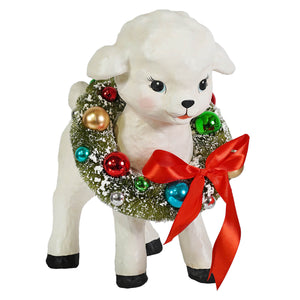 White ceramic noelle lamb figurine by bethany lowe design with festive wreath and red satin bow