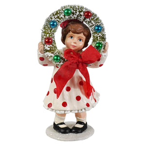 Noelle with wreath bethany lowe design figurine of girl in white dress with red polka dots holding colorful festive wreath
