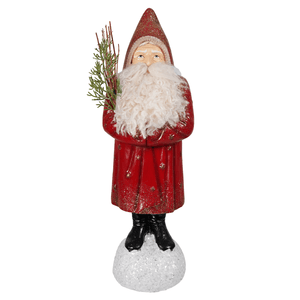 Red belsnickle santa figurine with glittery red finish and fluffy white beard holding greenery on snowy base by bethany lowe designs