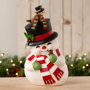 A charming white bethany lowe designs oh happy day snowman figurine with a black top hat and red scarf perfect for christmas snowman figures and decor