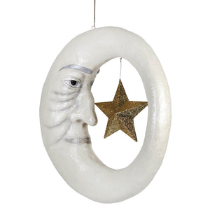 Old man in the moon white moon-shaped hanging ornament with a smiling face and glittering gold star inside its curve