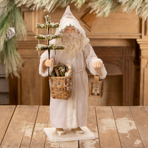 White santa claus figurine with long beard holding frosted pine tree woven basket and lantern from bethany lowe designs santa figures folk art santas