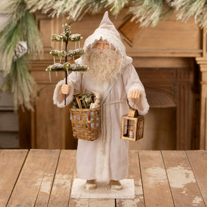 Old man winter santa white santa figure with fluffy beard holding snow-dusted tree and lantern by bethany lowe designs